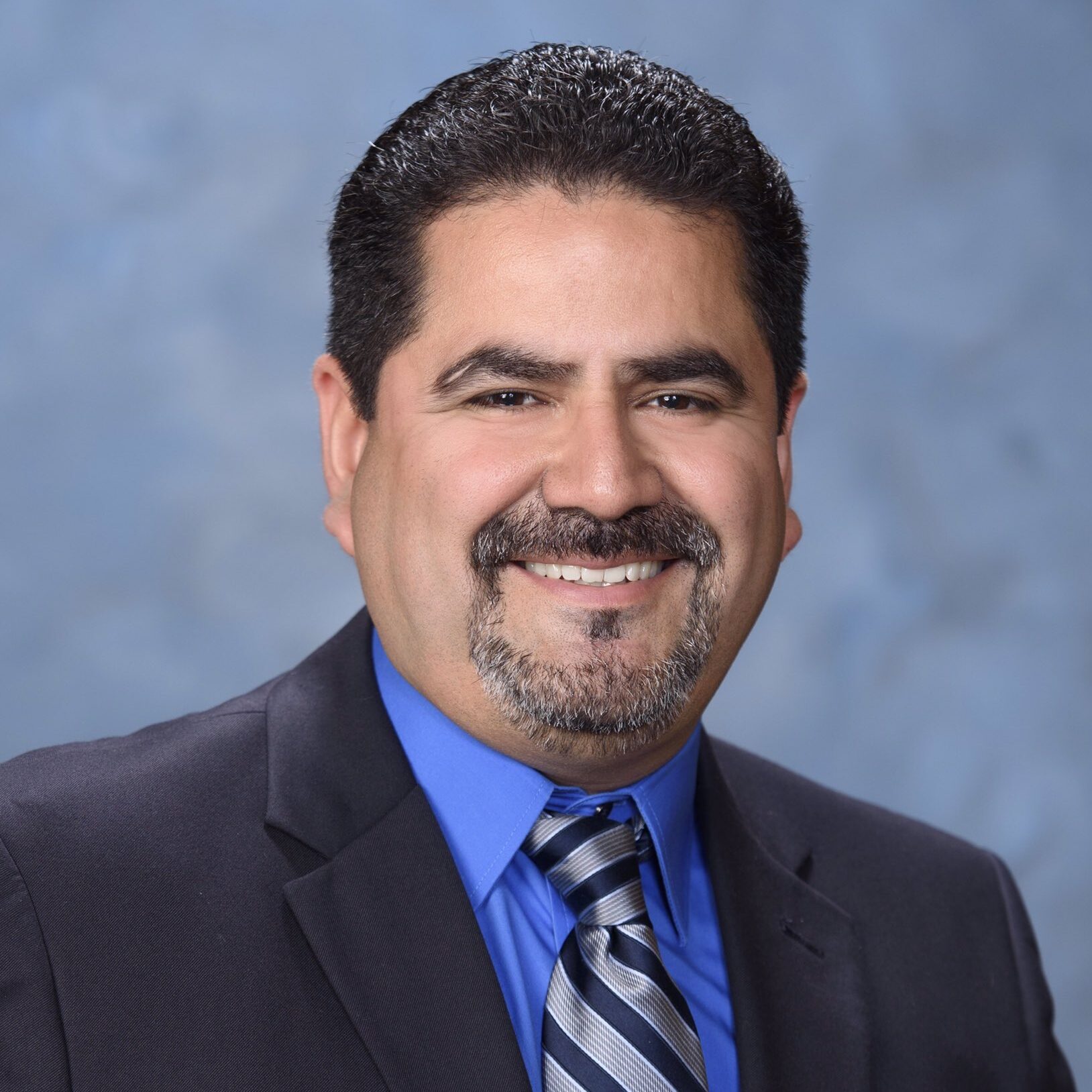 Dr. Enrique Vela, Board Member